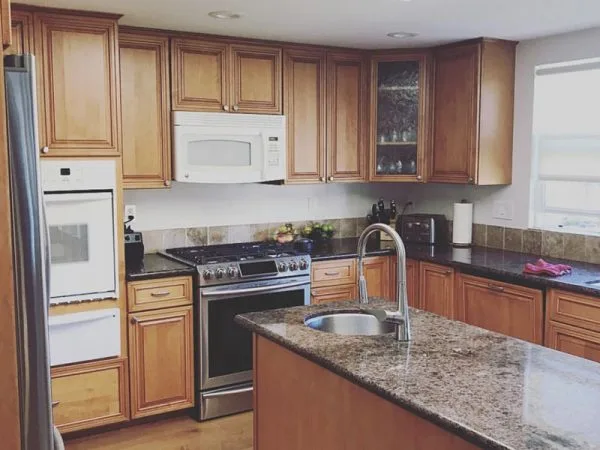 Kitchen cabinets before professional refinishing
